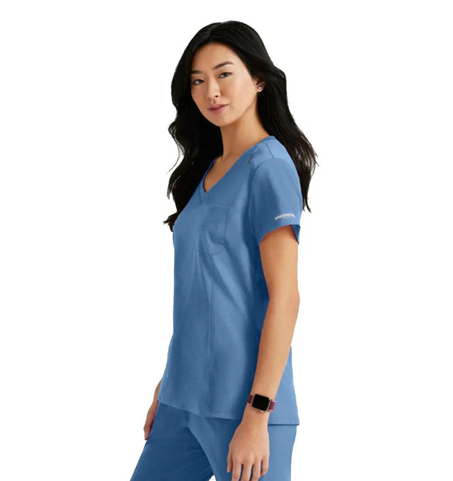SKECHERS™ by Barco Dignity 1-Pocket Tuck-In Scrub Top-Ciel Blue