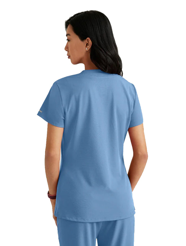 SKECHERS™ by Barco Dignity 1-Pocket Tuck-In Scrub Top-Ciel Blue